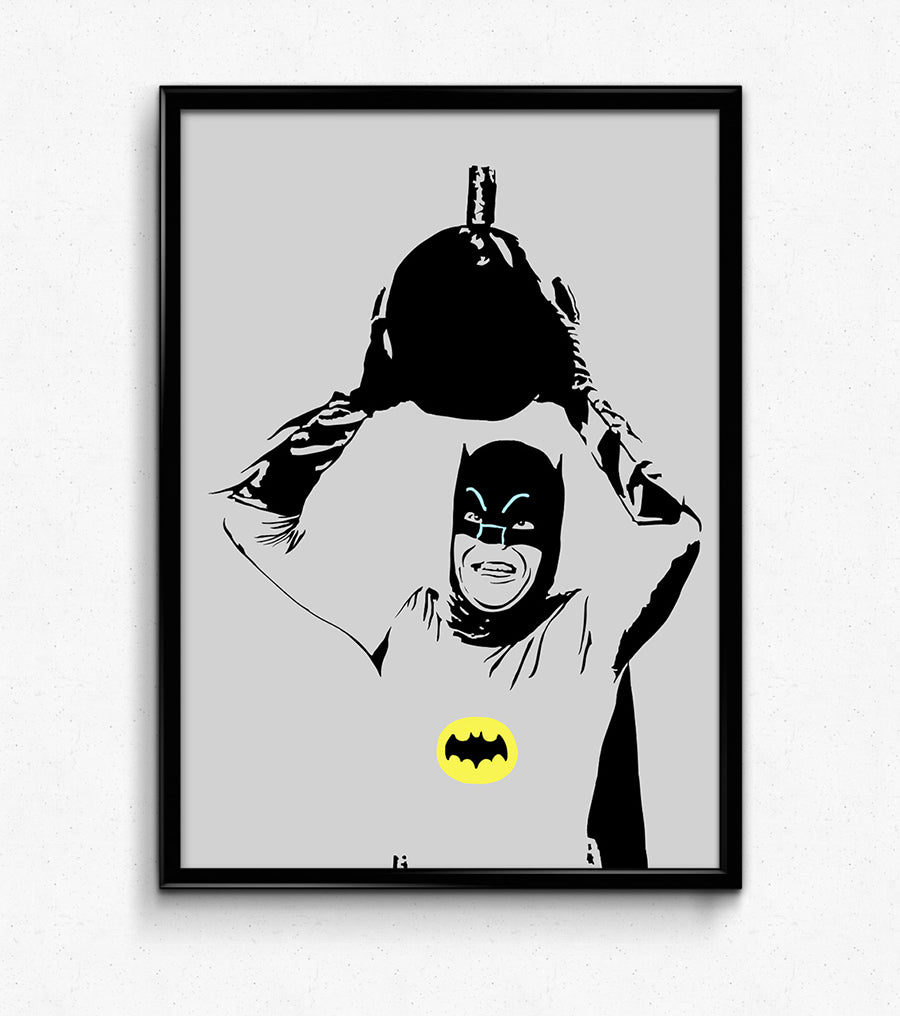 digital minimalist stencil illustration of the 1960s television version of batman played by adam west carrying a cartoon bomb overhead with a stern look on his face, he is wearing his bat cowl and tight leotard and cape, the illustration's lineart is black and the background is grey which also blurs into his suit, the batman logo on his chest is gold, the art print is framed on the wall